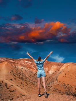 Woman on mars landscape with beauty sky sunset