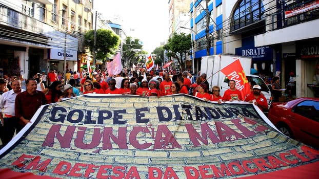 salvador, bahia, brazil - dec. 16, 2015: members of the trade union centrals, political parties and social movements mobilize in favor of president Dilma Rousseff and asking Eduardo Cunha to leave the presidency of the Chamber of Deputies....