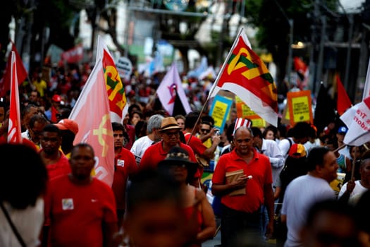 salvador, bahia, brazil - dec. 16, 2015: members of the trade union centrals, political parties and social movements mobilize in favor of president Dilma Rousseff and asking Eduardo Cunha to leave the presidency of the Chamber of Deputies....