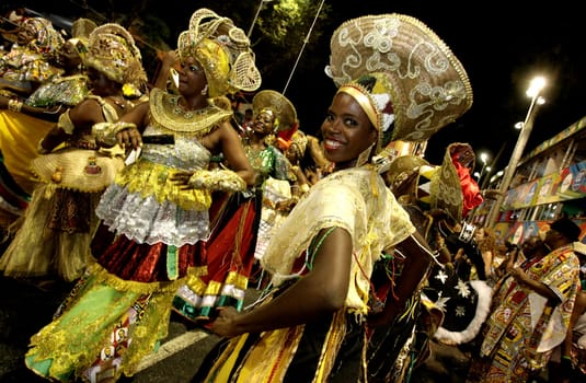 salvador, bahia / brazil - february 8, 2016: Members of the Ile Aiye Carnival Block are seen at the Osmar Circuit during Salvador Carnival.