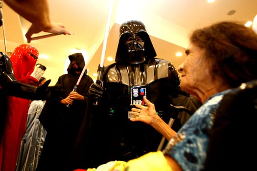 salvador, bahia, brazil - december 15, 2015: Star Wars fans celebrate their characters' fantasies during the release of episode VII - The Force Awakens in Salvador.
