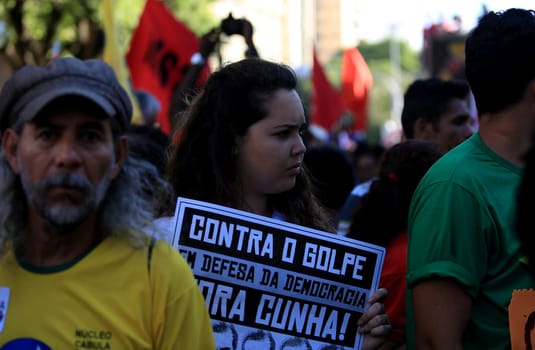 salvador, bahia, brazil - dec. 16, 2015: members of the trade union centrals, political parties and social movements mobilize in favor of president Dilma Rousseff and asking Eduardo Cunha to leave the presidency of the Chamber of Deputies....
