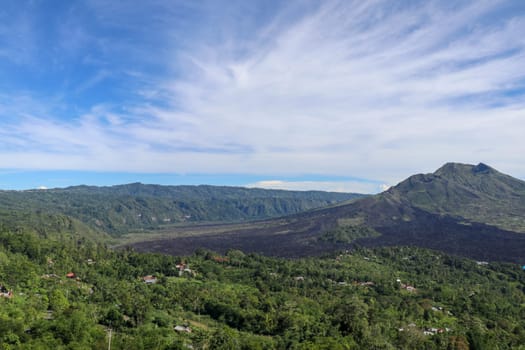 Panorama of Mount Batur or Gunung Batur, an active volcano located at the center of caldera the surrounding area on the island of Bali, Indonesia. Best background for your project.