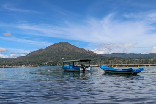 Panoramic indonesian landscape tropical island bali. Popular tourist attractions of Bali tropical island, amazing top view on Batur Indonesia. Batur lake and volcano are in the central mountains.