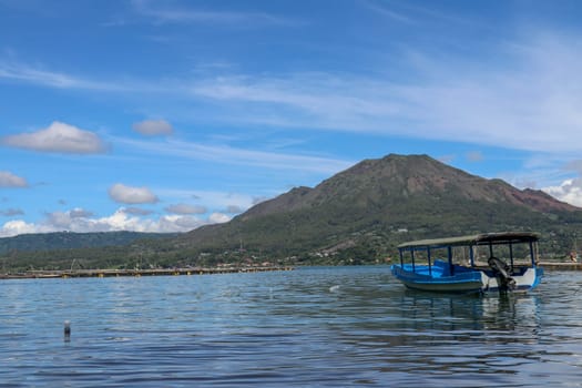 Panoramic indonesian landscape tropical island bali. Popular tourist attractions of Bali tropical island, amazing top view on Batur Indonesia. Batur lake and volcano are in the central mountains.