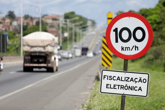salvador, bahia / brazil - April 24, 2019: Traffic sign warns drivers of speed radar deployed on BR 324 highway.