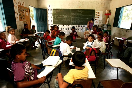 itabela, bahia / brazil - september 15, 2009: students and teacher in the rural area of the city of Itabela.