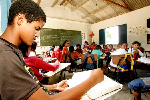itabela, bahia / brazil - september 15, 2009: students and teacher in the rural area of the city of Itabela.