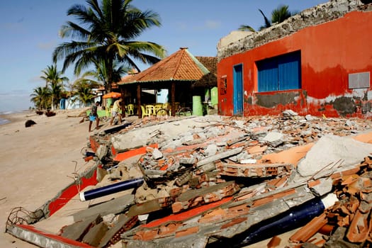 belmonte, bahia / brazil - july 19, 2009: destruction caused by seawater is seen under construction by the sea in the city of Belmonte.