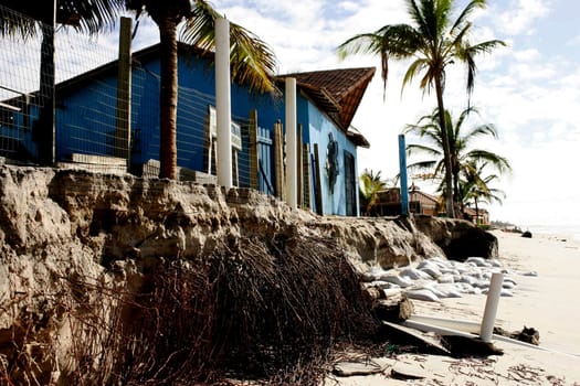 belmonte, bahia / brazil - july 19, 2009: destruction caused by seawater is seen under construction by the sea in the city of Belmonte.