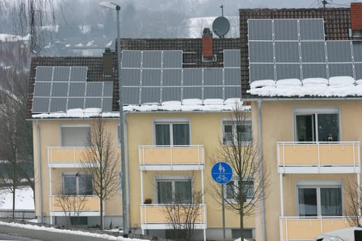 some solar panels on a house roof