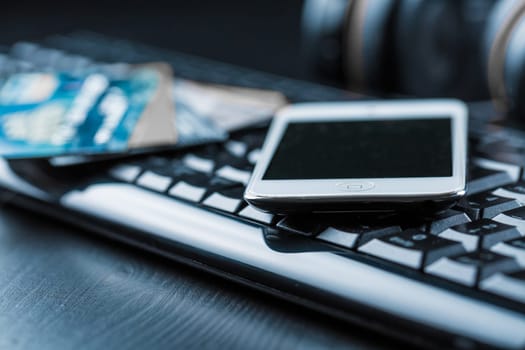 Bank creadit cards on keyboard. Concept of online banking and internet purchase. Soft focus.