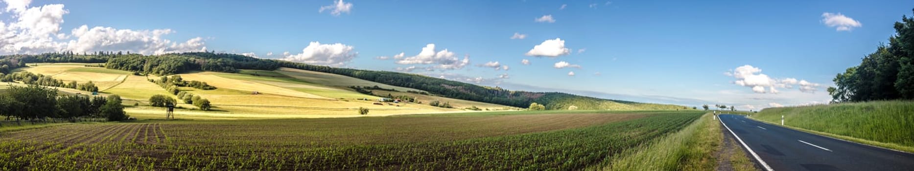 Idyllic panorama from farmland and meadows in hesse germany