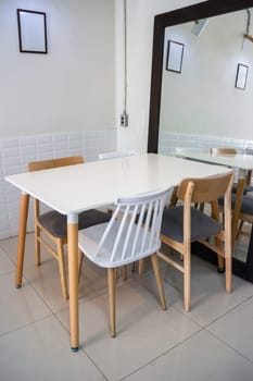 Interior classic wooden table and chairs, stock photo