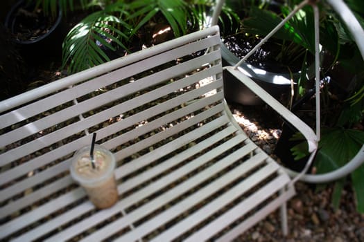Iced coffee drink in resort garden, stock photo