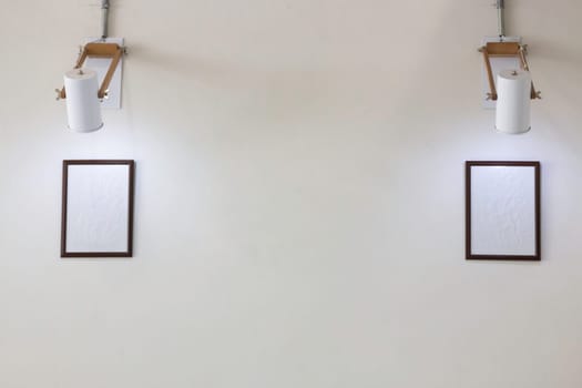 Simply picture frame on white wall, stock photo