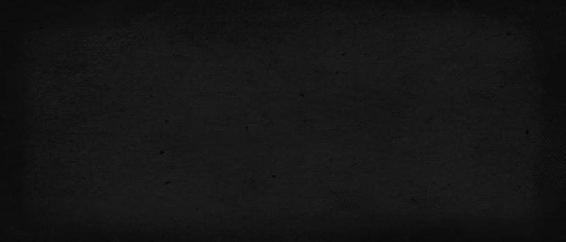 Black colored old paper texture with matt fibrous structure. Dark grunge rough background to be used as blackboard for educational projects. Blank chalkboard, ready for sketches, copy paste sheet.