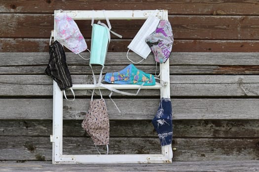 Various purchased and self-sewn protective masks, or makeshift masks against the corona virus