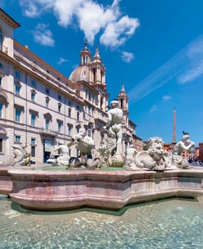 Piazza Navona in Rome on a sunny day. Baroque architecture and marble fountain with statues. Town square. Travel to European capitals