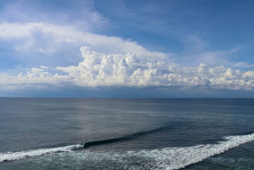 Beautiful blue sea sky or ocean water and scenic puffy clouds epic peaceful background. Panoramic dramatic sunset sky and tropical evening sea atmosphere.
