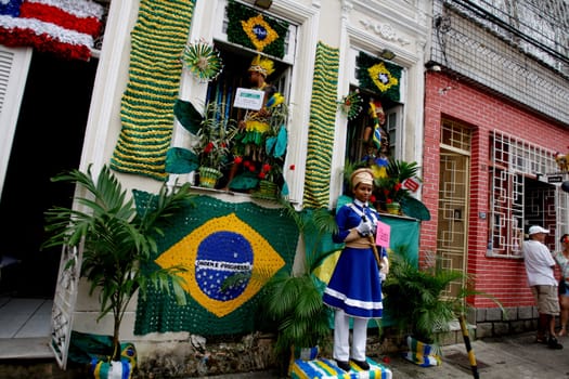 salvador, bahia / brazil - july 2, 2015: residence facade decorated with themes related to the independence of Bahia, is seen in the historic center of the city of Salvador, during the celebration of Dois de Julho.
