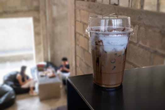 Iced coffee mocha in takeaway cup, stock photo