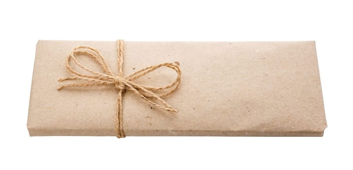 Gift craft box in natural style with burlap thread on white background.