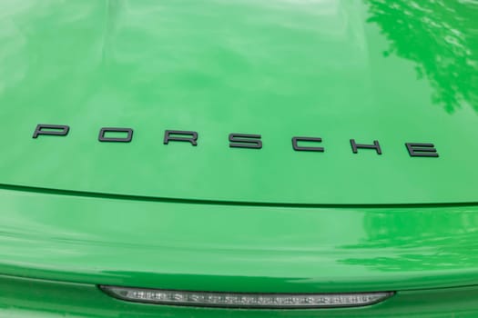 Wetzlar, Germany 2020_06_11: Lettering on a Porsche Car. Porsche AG is a German motor vehicle manufacturer founded by Ferdinand Porsche .