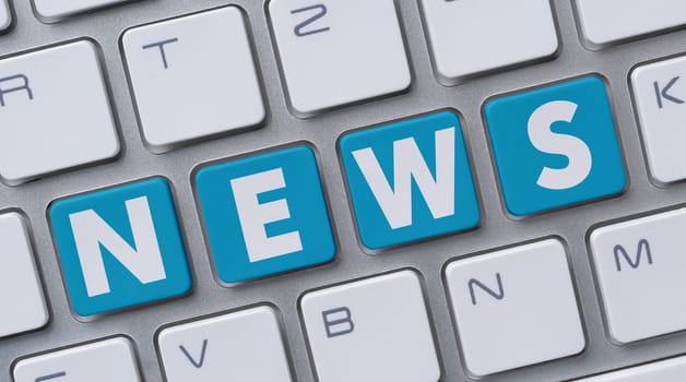 A computer keyboard with the word News