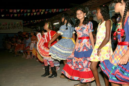 eunapolis, bahia / brazil - june 18, 2013: Eunapolis city public school students celebrate the festivities of Sao Joao, dancing gang.