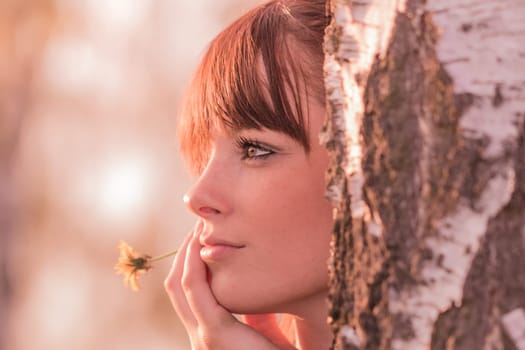 Young carefree woman with best health at sunny summer day in youth time. Perfect skin with authentic natural beauty cosmetic makeup.