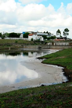 eunapolis, bahia / brazil - october 21, 2008: pond with waste in an industrial area in the city of Eunapolis.