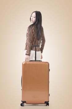 Modern Asian woman stand with a luggage.