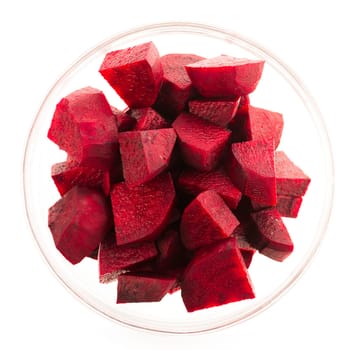 Beetroot wedges in glass bowl isolated on white.