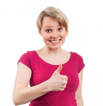 Young woman showing her thumb up, isolated on white