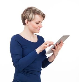 Girl using an electronic tablet, isolated on white