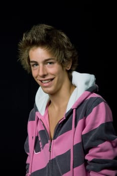 young casual man against a black background
