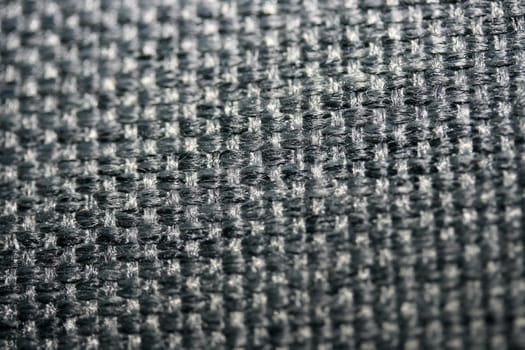 crosswise woven black fabric (synthetic fiber).