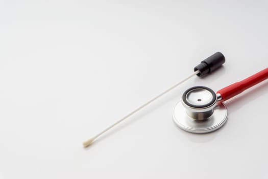 Medical swab and stethoscope on white background. Healthcare dan Copy Space concept