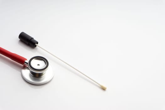 Medical swab and stethoscope on white background. Healthcare dan Copy Space concept