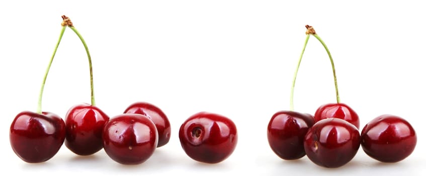 Sweet cherry isolated on white background. A cherry is the fruit of many plants of the genus Prunus, and is a fleshy drupe (stone fruit)
