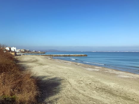 Beach and sea in bright sunlight