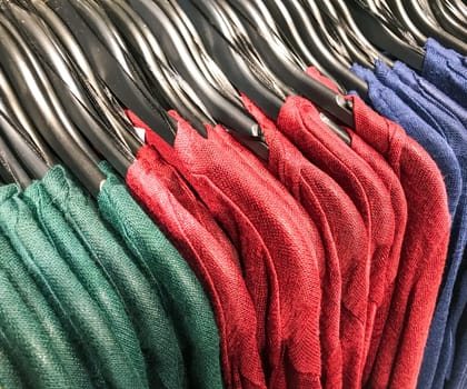 Different types of winter sweaters for sale at a nearby store