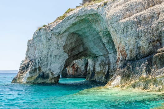 Gorgeous azure waters of blue caves on north east coast of Zakynthos island, Greece
