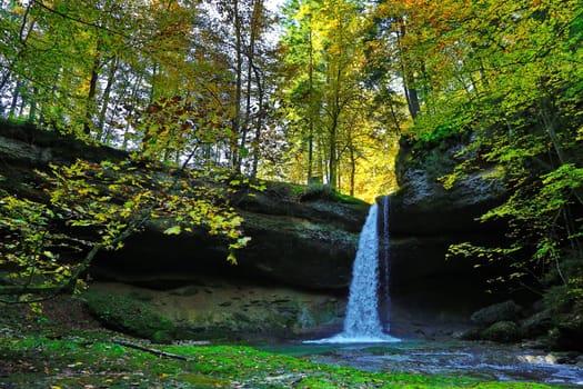 A romantic waterfall in the forest of Bavaria