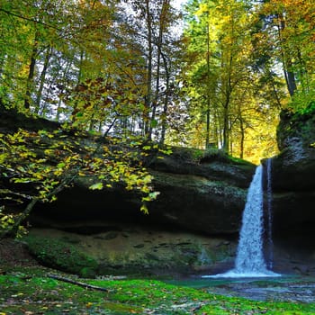 A romantic waterfall in the forest of Bavaria
