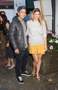Nina Bott pregnant ,Benjamin Baarz,.during the  Golden Things meets Pink Carpet" pre-closing Finissage at Studio 28   Hamburg"