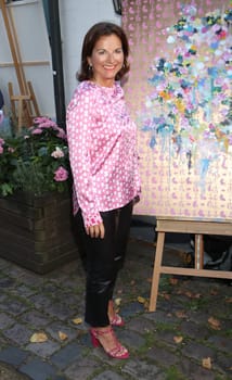 Claudia Obert, .during the  Golden Things meets Pink Carpet" pre-closing Finissage at Studio 28   Hamburg"