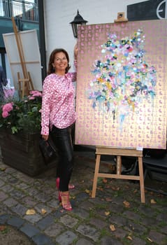 Claudia Obert, .during the  Golden Things meets Pink Carpet" pre-closing Finissage at Studio 28   Hamburg"