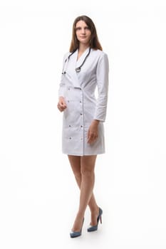 Model in medical clothing with stethoscope poses on a white background
